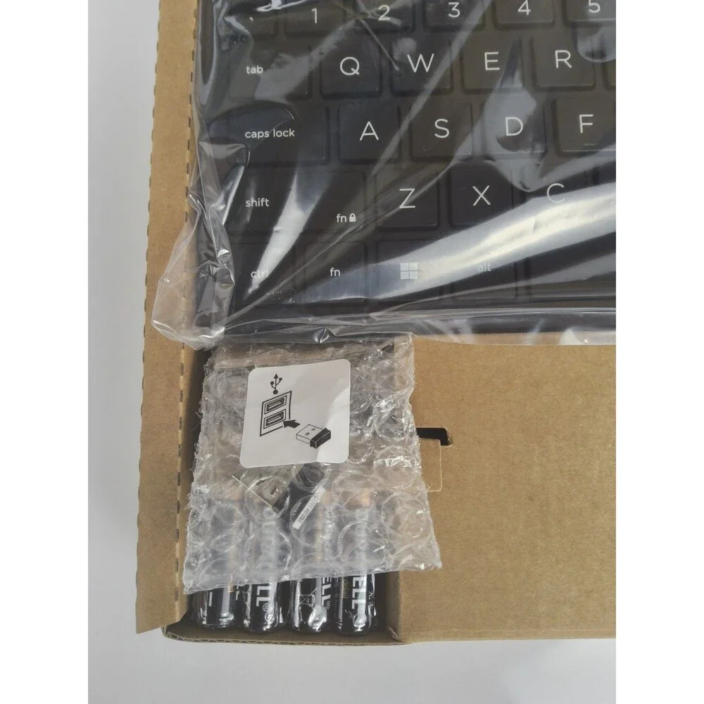Slim Keyboard and wireless mouse Never used still in box with plastic